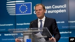 FILE - European Council President Donald Tusk speaks during a media conference at an EU summit in Brussels, March 19, 2015.